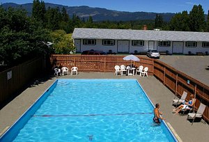 Somass Motel & RV in Vancouver Island, image may contain: Hotel, Pool, Resort, Chair