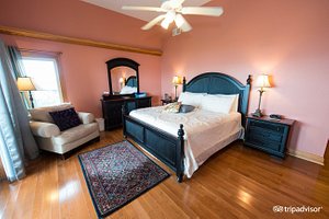 The Inn on Pamlico Sound in Hatteras Island, image may contain: Flooring, Home Decor, Furniture, Bedroom