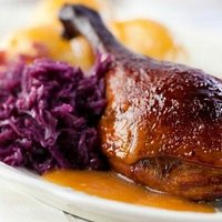 Roasted duck with bread dumplings and cabbage