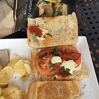 The tomato mozzarella sandwich with a ridiculous 1/2 ounce of cheese.