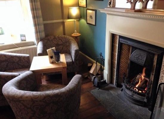 tea and cake by the fire on a cold winters day