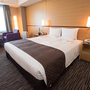 Haneda Excel Hotel Tokyu in Ota, image may contain: Furniture, Bedroom, Bed, Indoors
