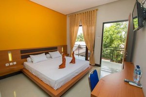 New Melati Hotel in Gorontalo, image may contain: Hotel, Resort, Interior Design, Furniture