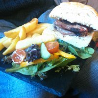 A beautifully presented and tasty steak and red onion lunch