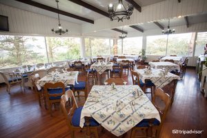 Inn Rocio in Luzon, image may contain: Restaurant, Dining Room, Dining Table, Table