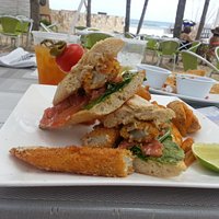 for lunch, try the breaded fish sandwich on the beach
