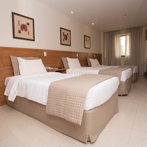 Hotel Granada in Rio de Janeiro, image may contain: Interior Design, Indoors, Bed, Furniture