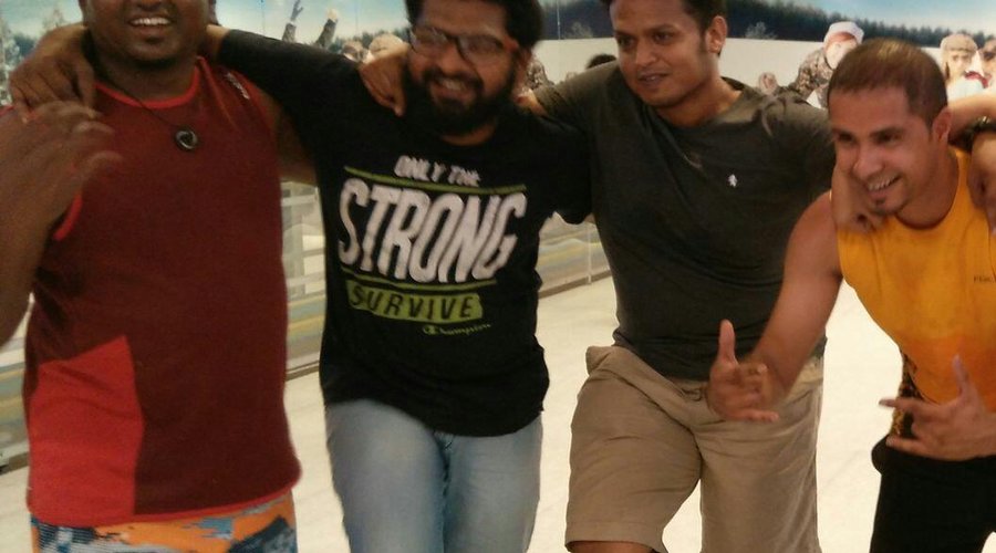 With pals..