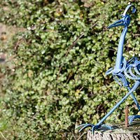 One of the many unique rustic garden sculptures