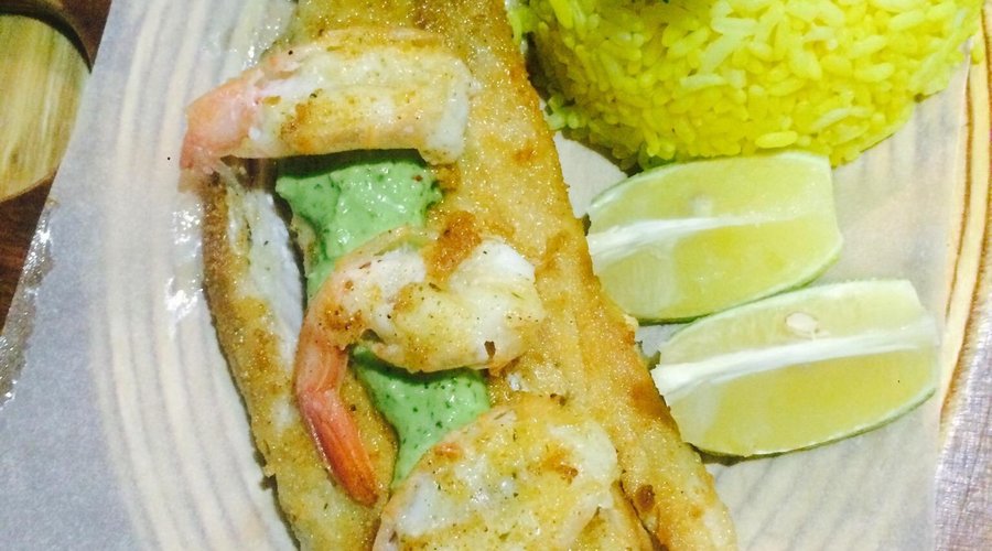 Grilled Dorado with a spicy coconut prawn tail sauce
