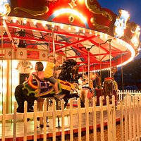 The vintage carousel at Davenport Park as seen at night.