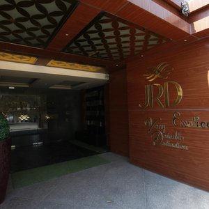 JRD Exotica in New Delhi, image may contain: Interior Design, Furniture, Bed, Chair