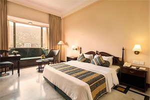 KK Royal Hotel & Convention Centre in Jaipur, image may contain: Bed, Furniture, Home Decor, Hotel
