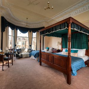 Kildonan Lodge Hotel in Edinburgh, image may contain: Furniture, Bedroom, Indoors, Bed