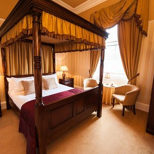 Kildonan Lodge Hotel in Edinburgh, image may contain: Furniture, Bedroom, Indoors, Bed