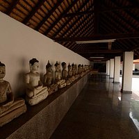 at the rear of the main prayer hall you will find these Buddhas in a row.