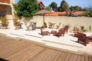 Les Mimosas in Argeles-sur-Mer, image may contain: Backyard, Chair, Housing, Porch