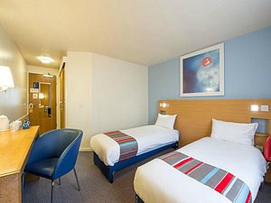 Travelodge Reading M4 Eastbound in Burghfield, image may contain: Dorm Room, Furniture, Bedroom, Chair