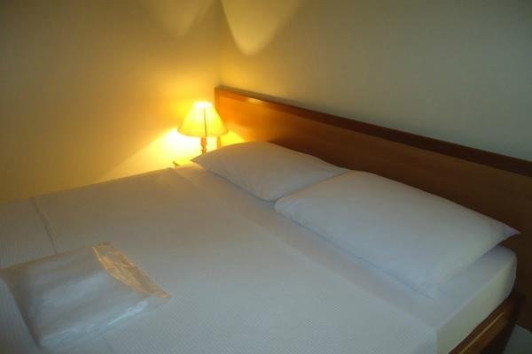 Foto da cama da Suíte 23