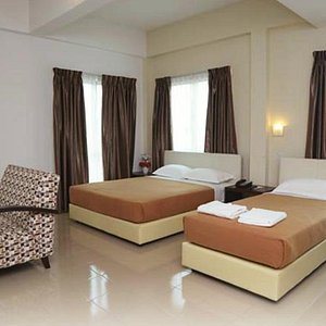 Hotel Kobemas Melaka in Melaka, image may contain: Chair, Furniture, Bed, Home Decor