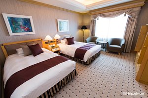 Hotel Metropolitan Nagano in Nagano, image may contain: Bed, Furniture, Hotel, Dorm Room