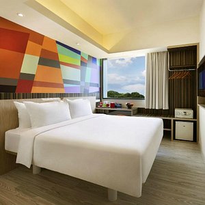 Genting Hotel Jurong in Singapore, image may contain: Interior Design, Indoors, Bed, Furniture