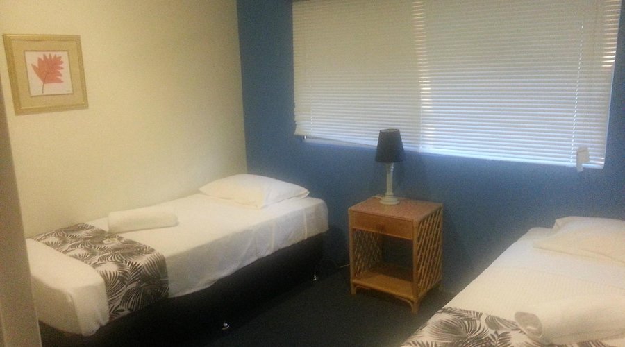 One of the two bedrooms - the one with two twin beds.
