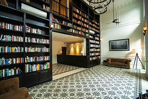 The Alcove Library Hotel in Ho Chi Minh City, image may contain: Library, Furniture, Screen, Monitor