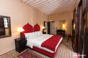 Algila Fes in Fes, image may contain: Hotel, Resort, Bed, Furniture
