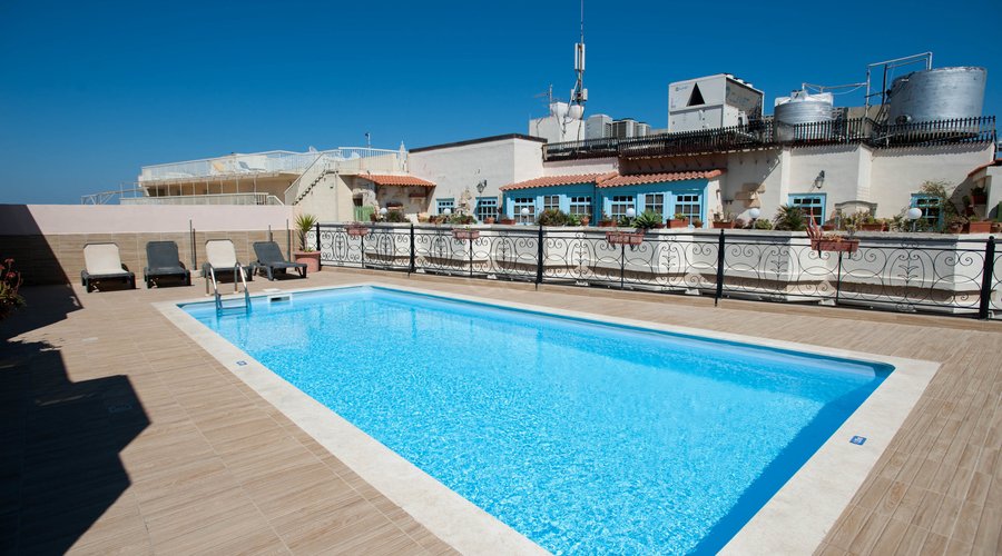 The Rooftop Outdoor Pool at the Windsor Hotel