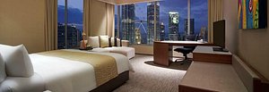 Traders Hotel, Kuala Lumpur in Kuala Lumpur, image may contain: Penthouse, Condo, Chair, Bed