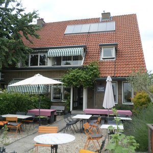 Bed en Breakfast met beneden het restaurant en terras