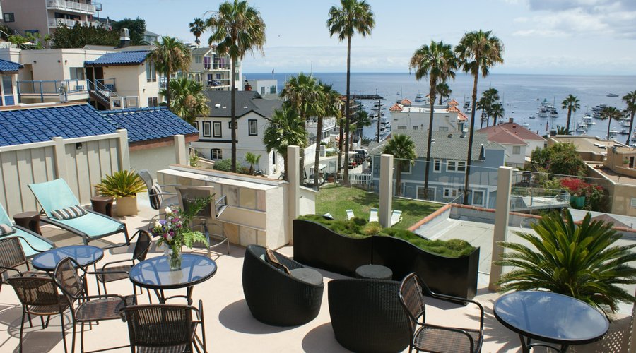 Enjoy breakfast or a glass of wine on our ocean view rooftop deck