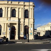 Oamaru I-SITE can be found in this gorgeous Oamaru stone building on the corner of Thames and It