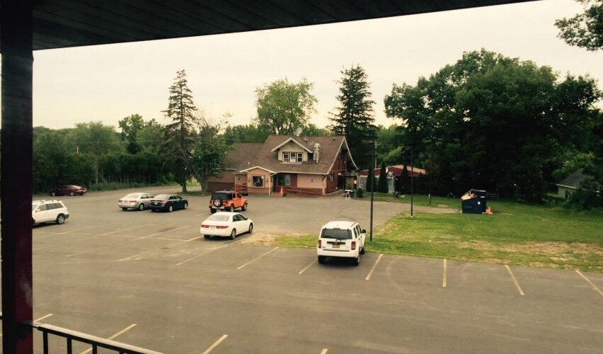 Large dresssing area; faulty hot water handle; daytime view of Philly Bar. & Grill;