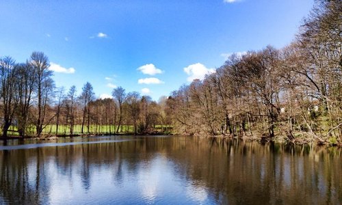 Beautiful lake with natural jogging trial nearby the hotel, within 5 minutes walk located at the