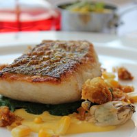 West Country Hake served with Mussel, Sweetcorn and Chicken Skin