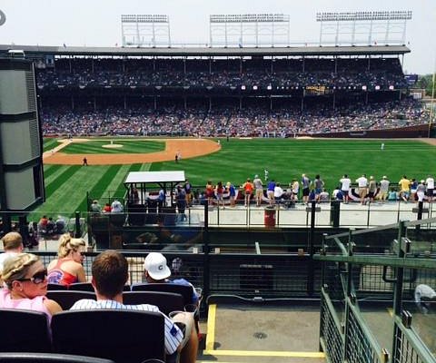 Battle between Cubs and Wrigley rooftops heating up