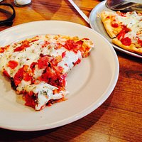 Slice of 10" Slaughterhouse Five Speciality Pizza