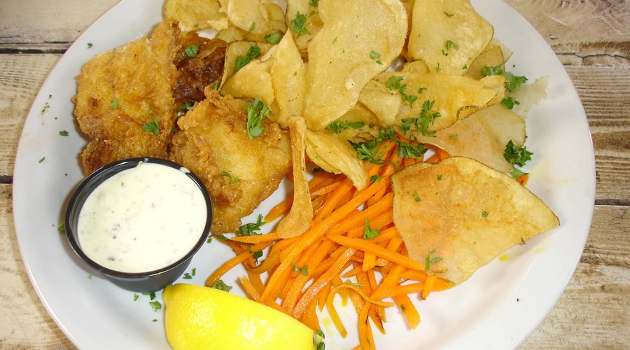 The 2-piece Bell's Battered Fish and Chips, with cooked shoestring carrots, tartar sauce and lem