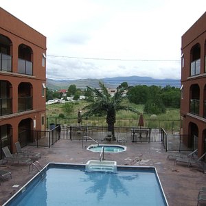 view of pool and hills