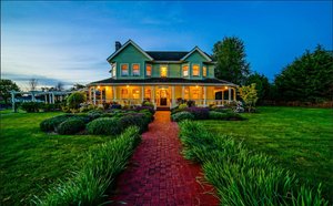 Edenwild Boutique Inn in Lopez Island, image may contain: Grass, Cottage, Lawn, Villa