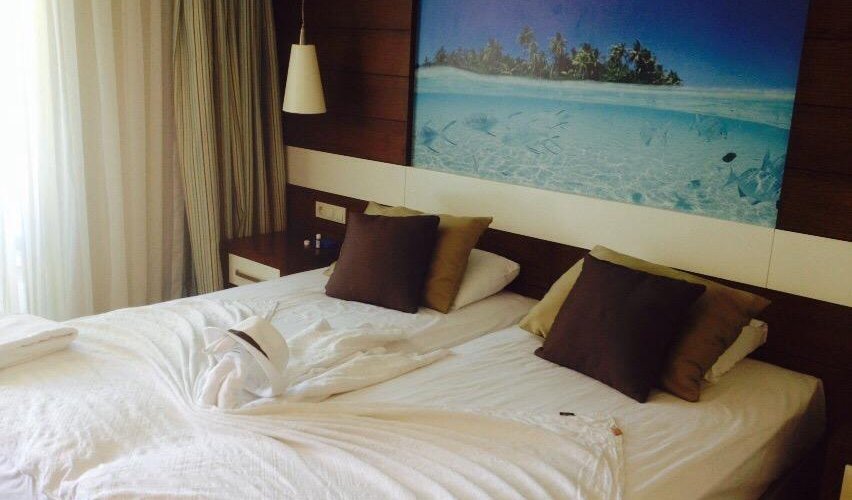 Suite mit grossem Einzelbett und Balkon