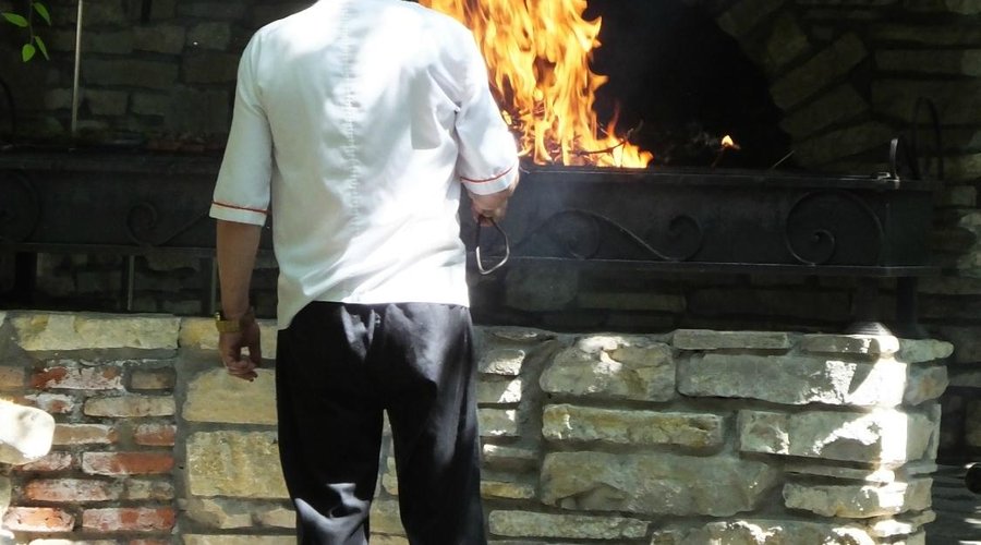 Chef cooking barbecue meat