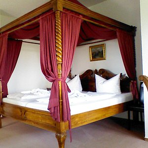 Comfy Four Poster Bed in Room 1