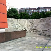 images at base of memorial tower