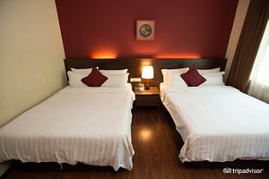 Hotel Eden54 in Kota Kinabalu, image may contain: Furniture, Bedroom, Room, Indoors