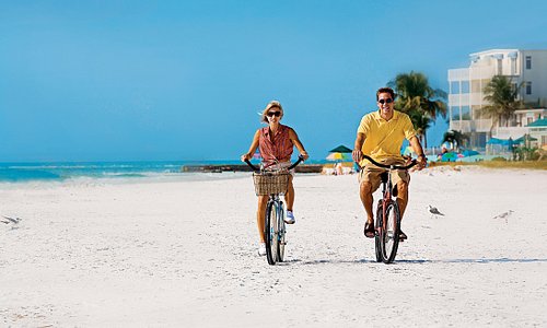 Pedal beach cruisers right on the sand on Siesta Key.