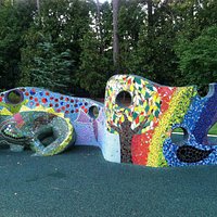 There's seating throughout the park as well as structures for the children to play on.