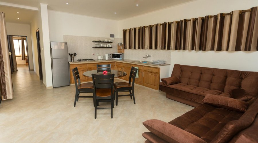 Dining room and Kitchen with Sofa Beds in Suite